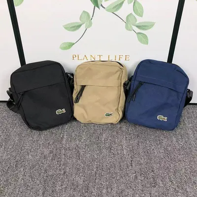 ￥75 LACOSTE BAG 372104 (长16CM*宽6CM*高21CM)