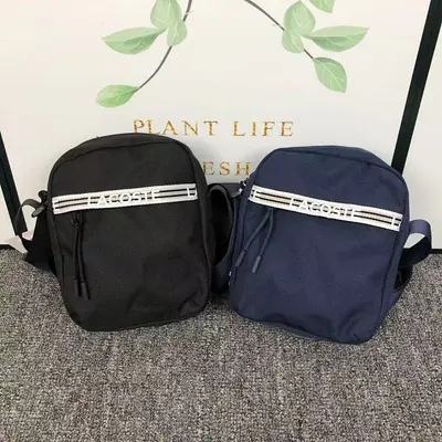 ￥119 LACOSTE BAG 272246 (长17CM*宽7CM*高21CM)