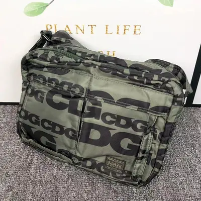 ￥109 COMME DES GARCONS BAG 272248 (长28CM*宽10CM*高19CM)
